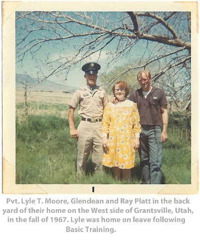 Pvt. Lyle T. Moore, Glendean and Ray Platt in the backyard of their home on the West side of the Grantsville, Utah, in the fall of 1967. Lyle was home on leave following Basic Training